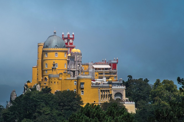 The colorful Pena Palace in Sintra, with a guide on how to plan the perfect day trip from Lisbon.