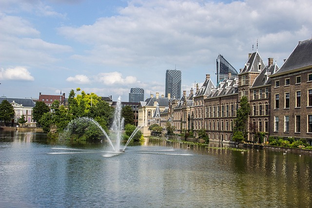The historic Binnenhof parliament buildings in The Hague, a key city for culture and travel in the Netherlands.